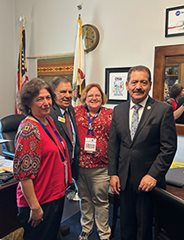 Illinois school board members meet with Rep. Chuy Garcia.